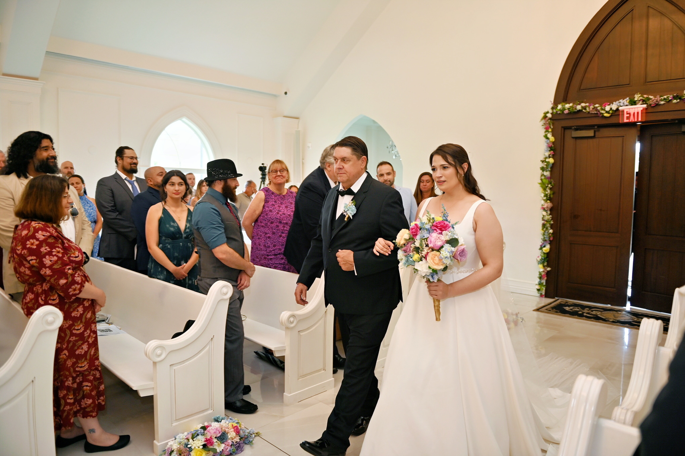 Todd escorting his daughter down the aisle at her wedding.